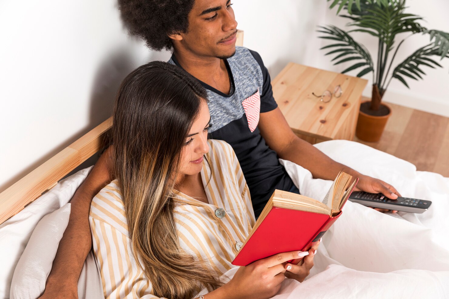 Illustration of a couple sitting apart on a sofa, each lost in thought